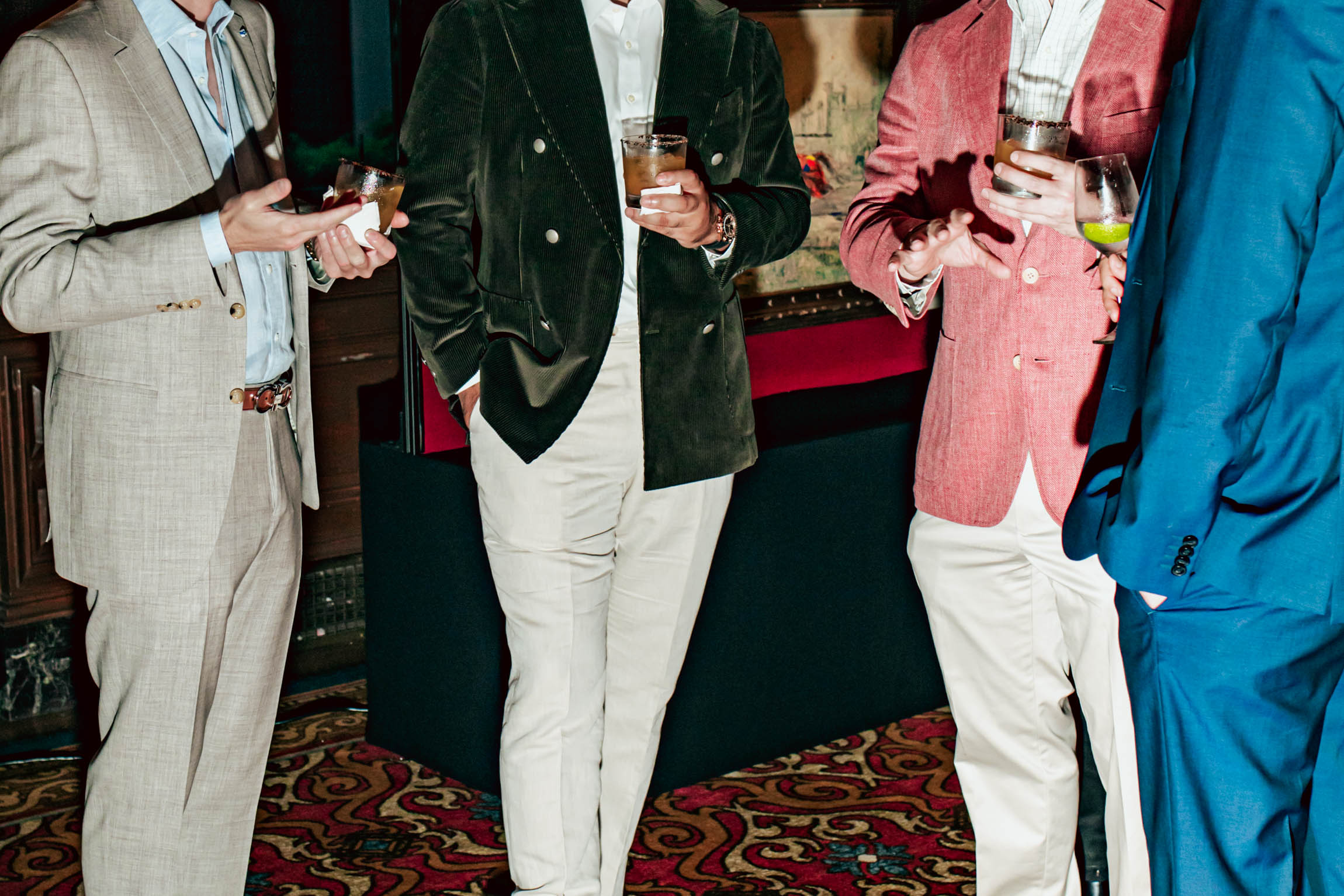 Men Smiling at Dinner Table